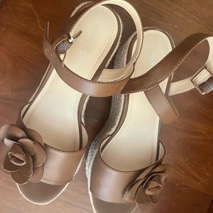 Brown platform sandals.